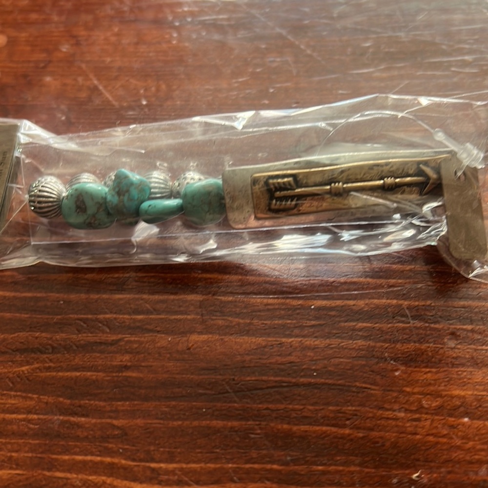 Brand new beaded bracelet with an arrow